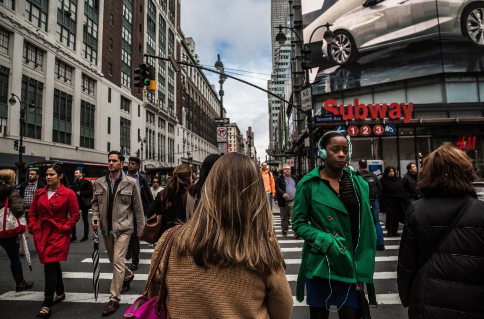 Free Image of Urban street scene with diverse pedestrians 