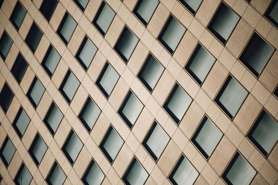 Free Image of Repeated patterns on office building facade 