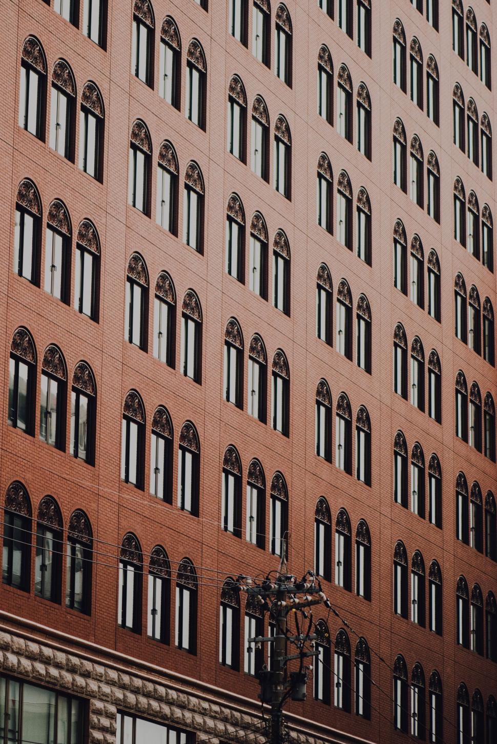 Free Image of Facade with repeating arched windows 