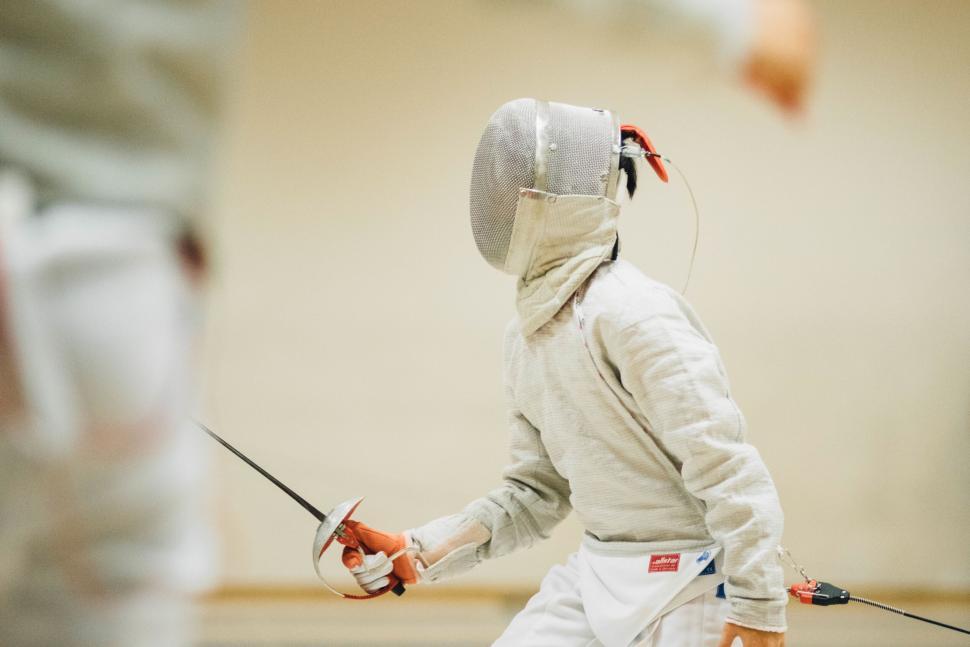 Free Image of Focused fencer in action during duel 