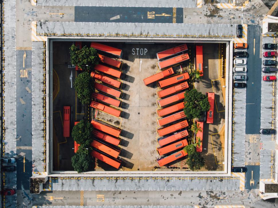 Free Image of Aerial view of buses in a parking lot 