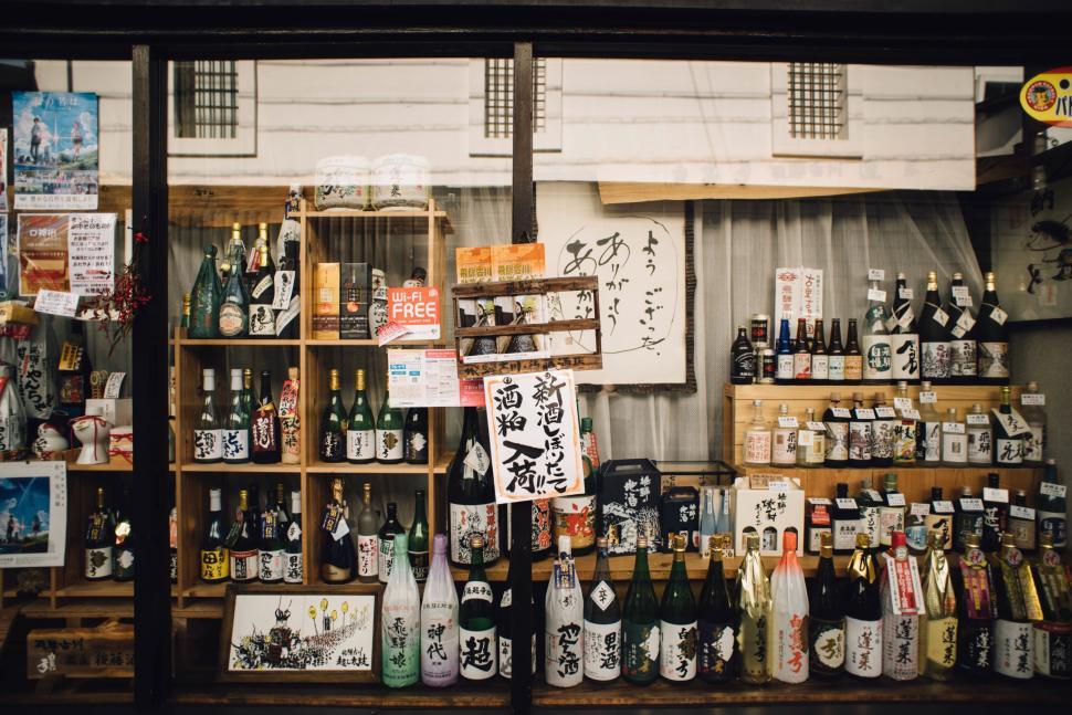 Free Image of Japanese liquor store with assorted bottles 