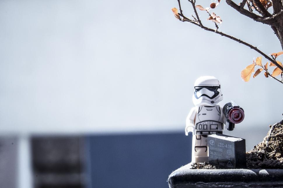 Free Image of Stormtrooper toy figure against blue sky 