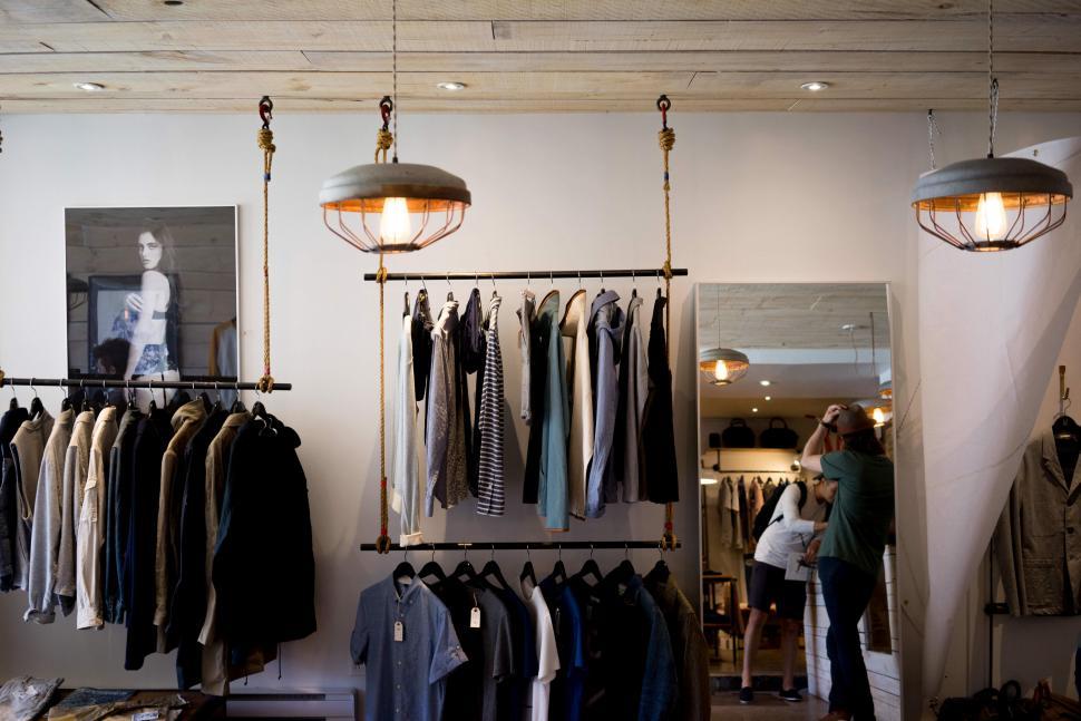 Free Image of Well-lit clothing boutique with hanging apparels 