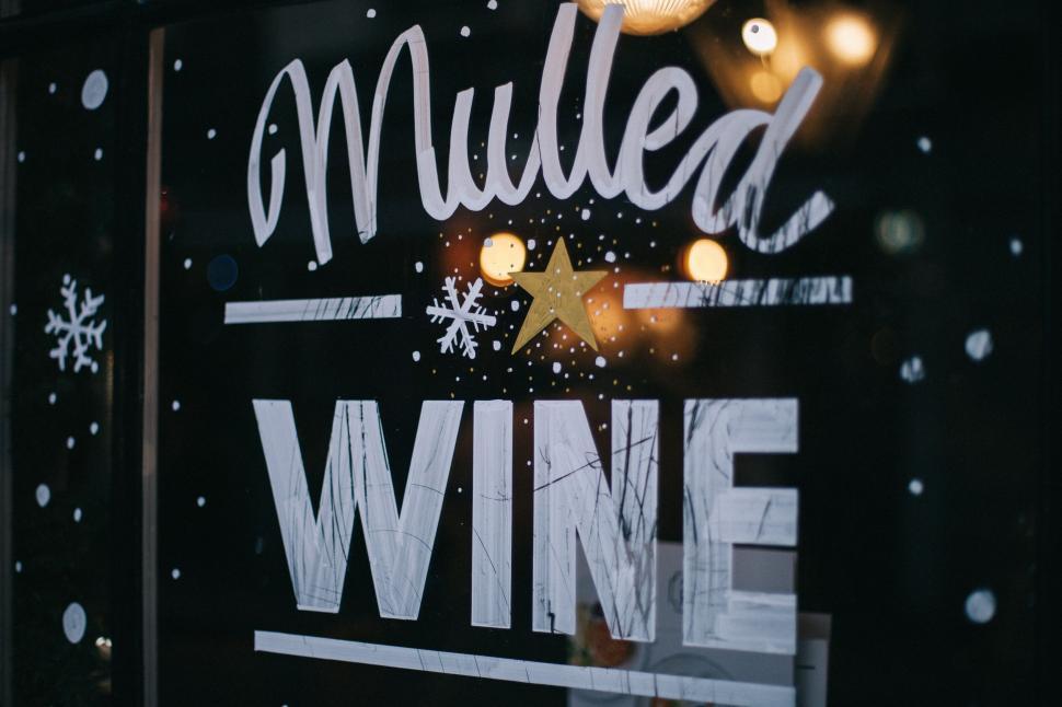 Free Image of Festive Mulled Wine Sign in a Window 