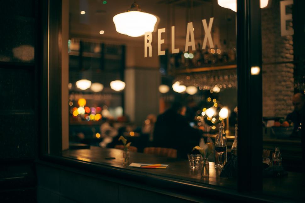 Free Image of Cozy Restaurant Interior with Relax Sign 