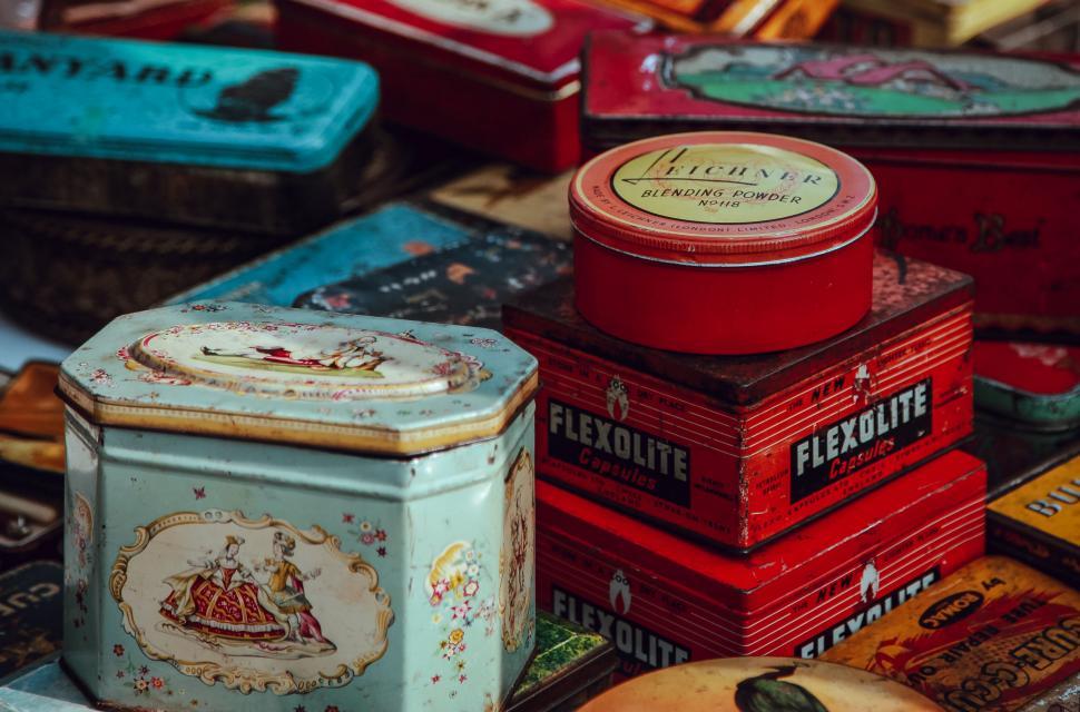 Free Image of Assorted vintage tins in colorful array 