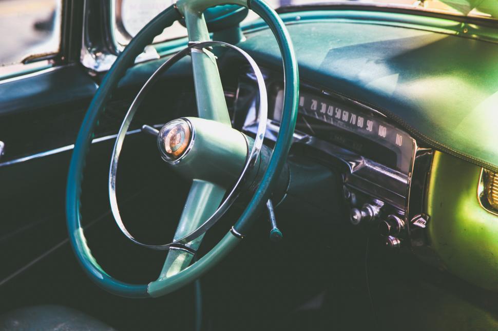 Free Image of Vintage car interior with focus on steering wheel 
