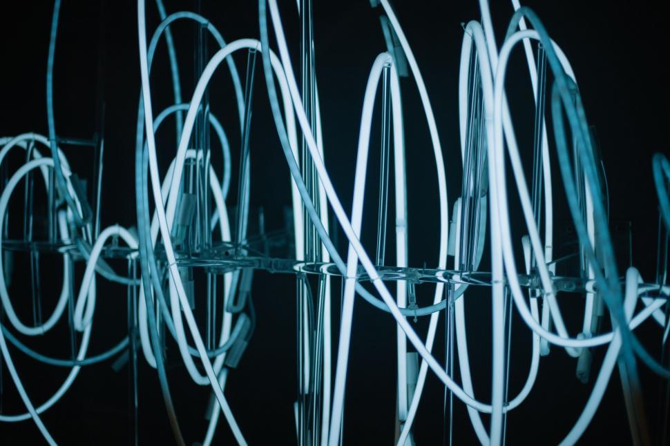 Free Image of Abstract blue neon light loops 