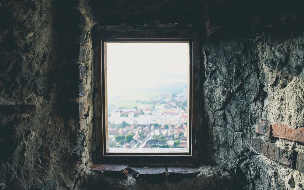 Free Image of Window view of a town from a castle 