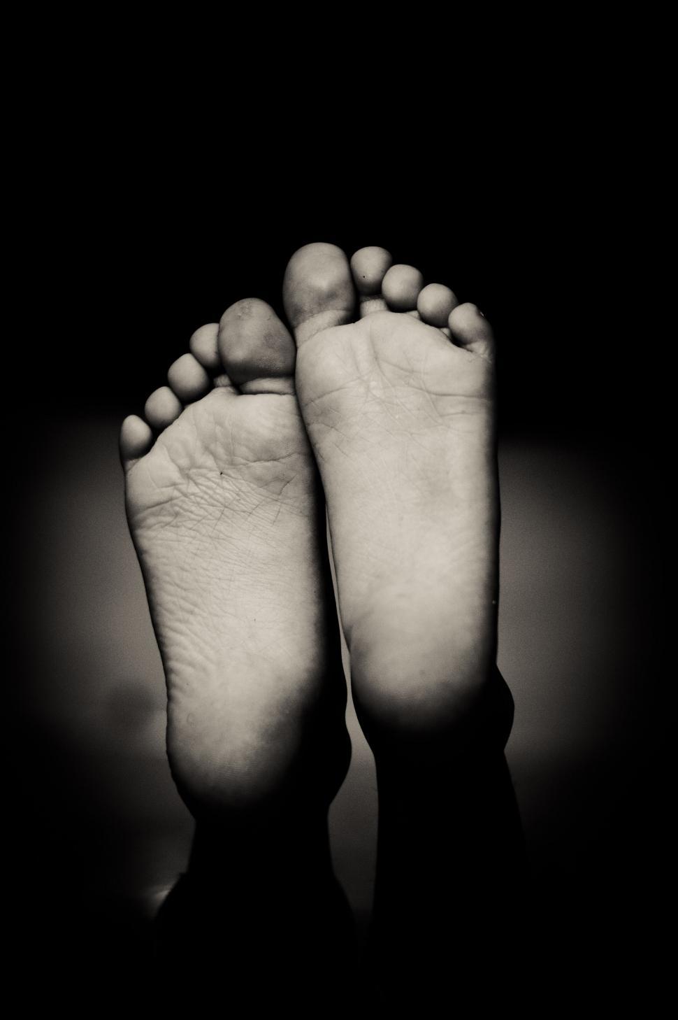 Free Image of Sole of bare human feet in black and white 