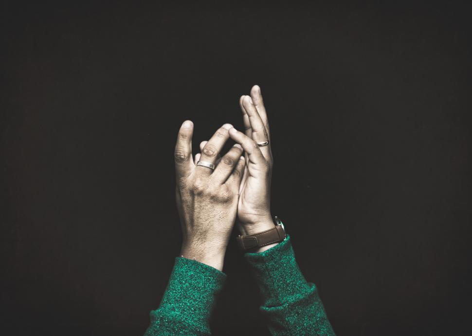 Free Image of Clasped hands in celebration or gratitude 