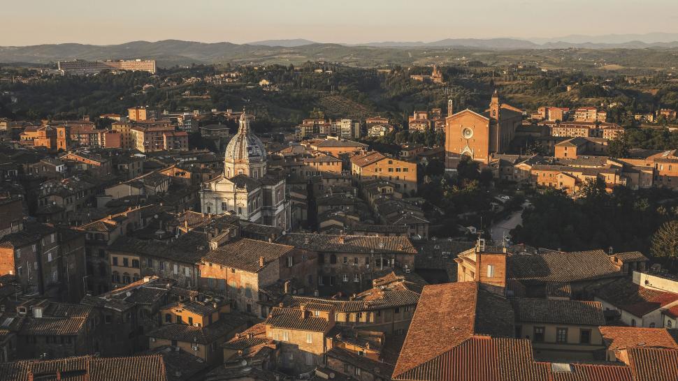 Free Image of Sunset over an ancient Italian cityscape 