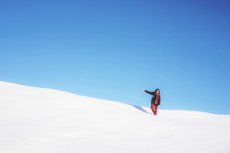 Free Image of Isolated figure on a snowy expanse 