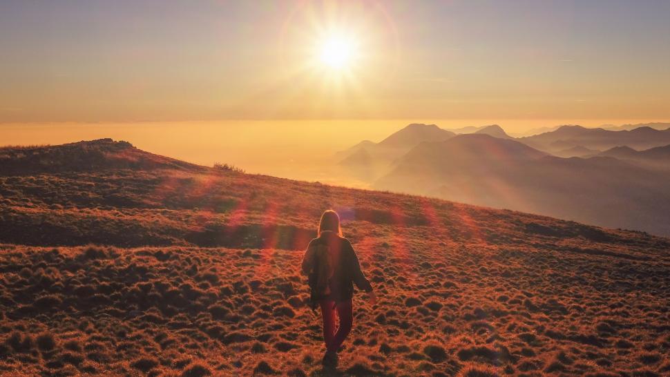 Free Image of Sunrise hike on a mountainous landscape 
