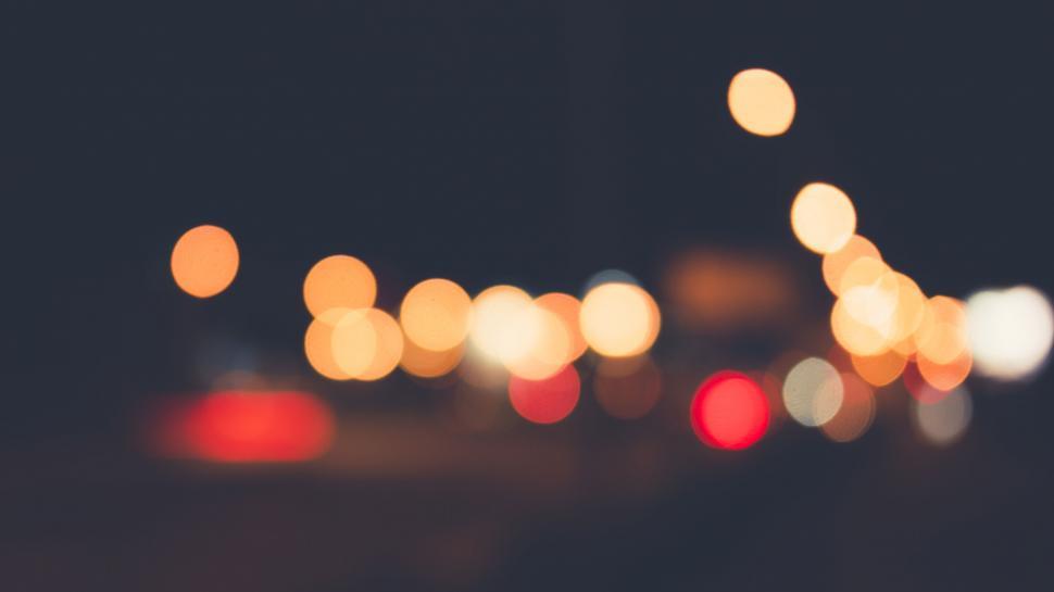 Free Image of Abstract bokeh lights with warm tones 