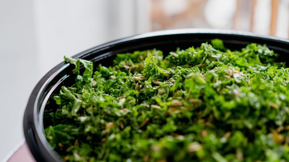 Free Image of Close-up of a fresh kale salad in a bowl 