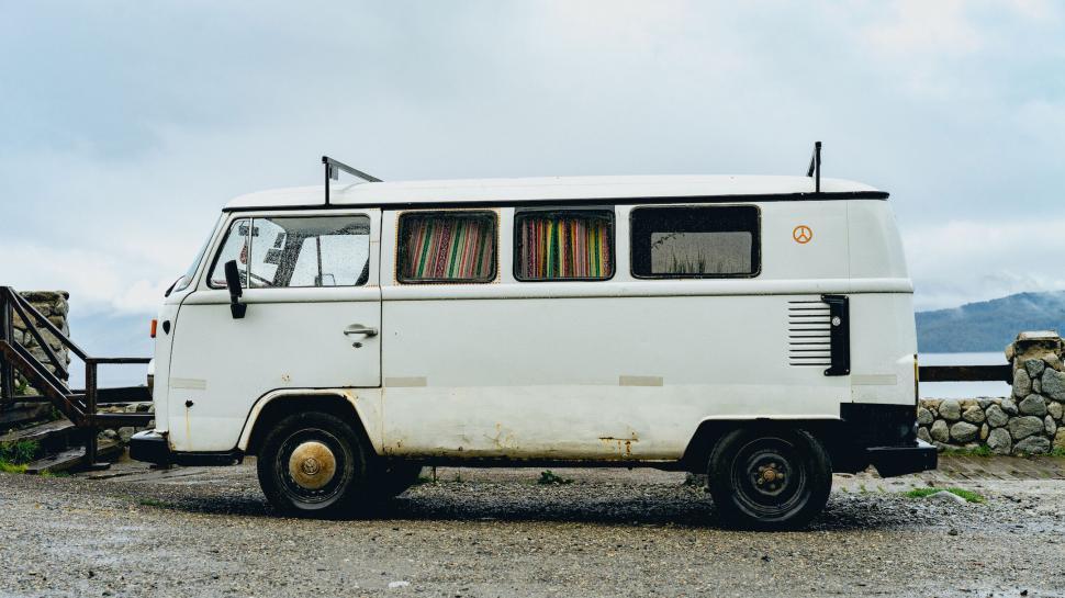 Free Image of Vintage white van parked by the roadside 