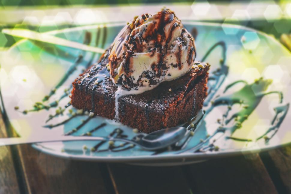 Free Image of Mouth-watering chocolate brownie with ice cream 