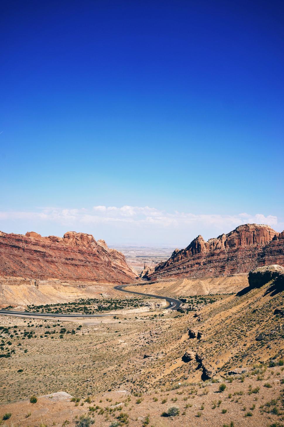 Free Image of Majestic canyon landscape under a blue sky 