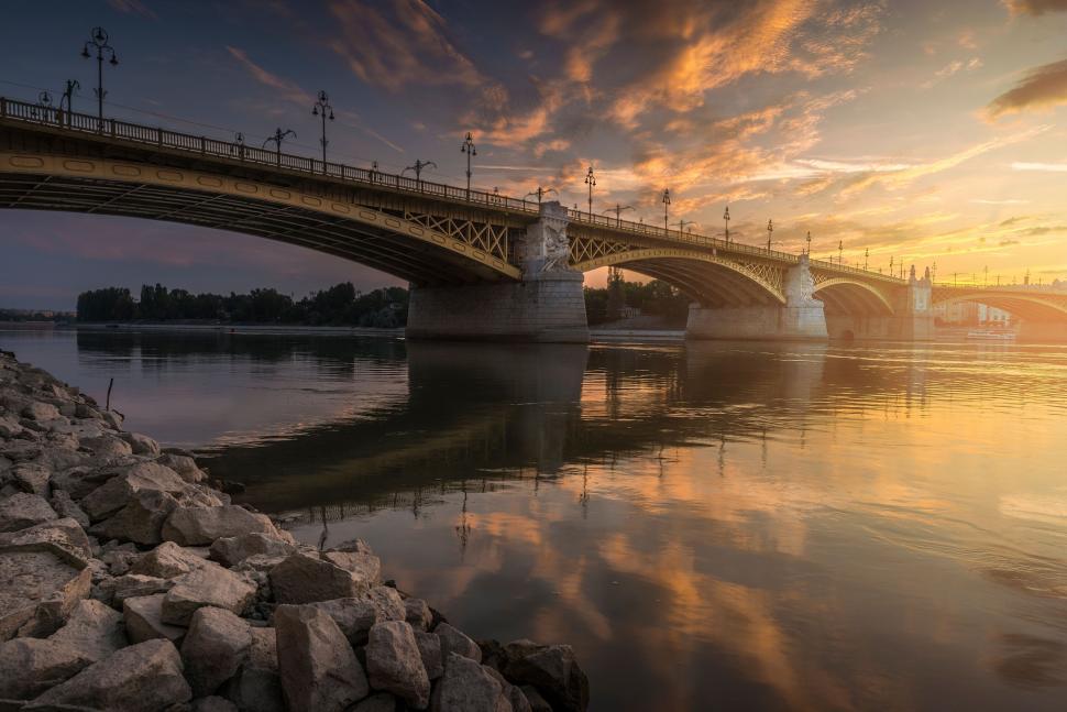 Free Image of Sunset view of bridge over river 