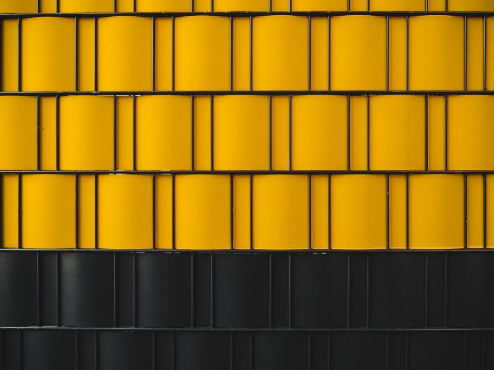 Free Image of Yellow and black barrels wall pattern 