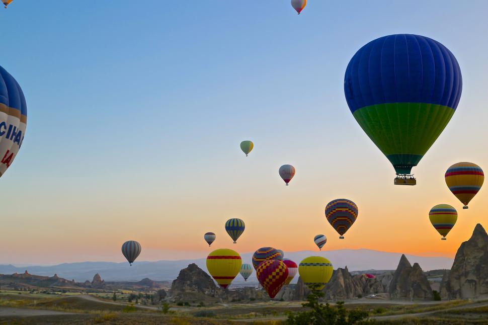 Free Image of Hot air balloons floating at sunrise 