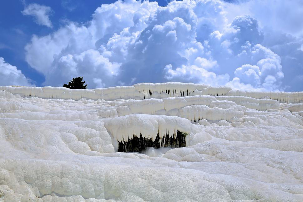 Free Image of White terraces with blue skies and clouds at Pamukkale 