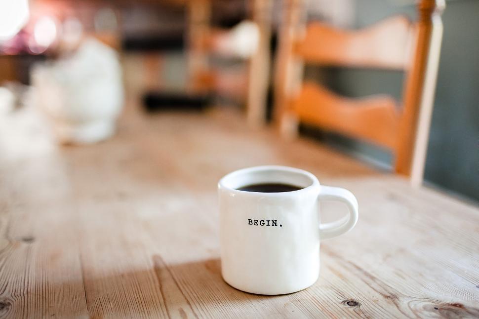 Free Image of Inspiring coffee mug on table 