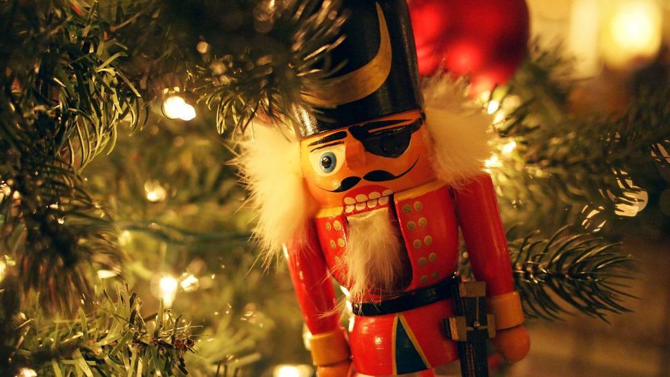 Free Image of Nutcracker ornament close-up with lights 