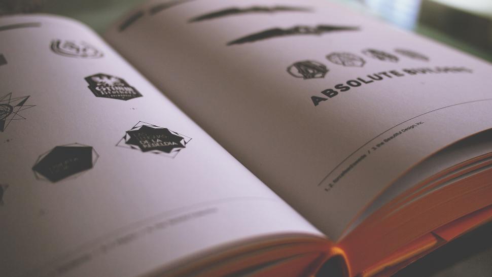 Free Image of Open book with brand logos 