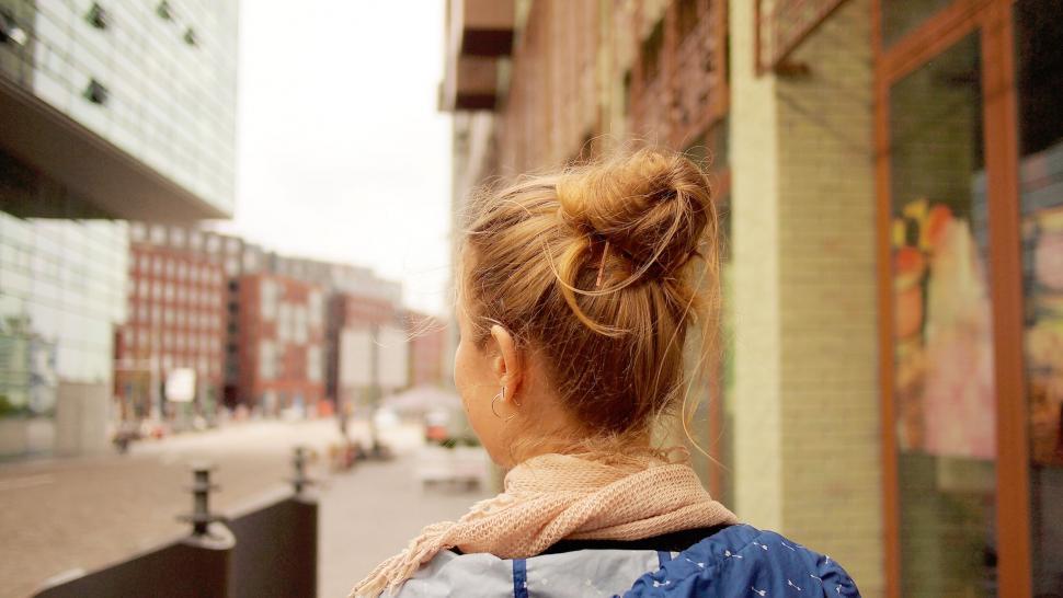 Free Image of Woman gazing at urban landscape view 