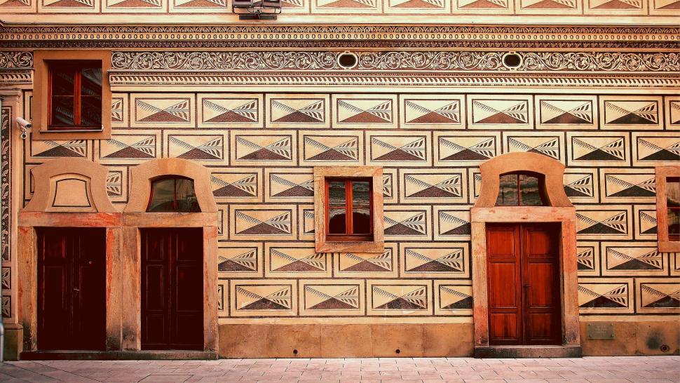 Free Image of Intricate geometric patterns on classical facade 