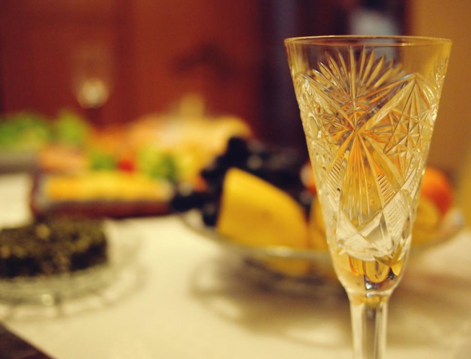 Free Image of Crystal wine glass on a festive table 