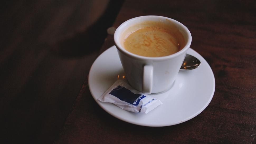 Free Image of Fresh cup of espresso on a wooden table 