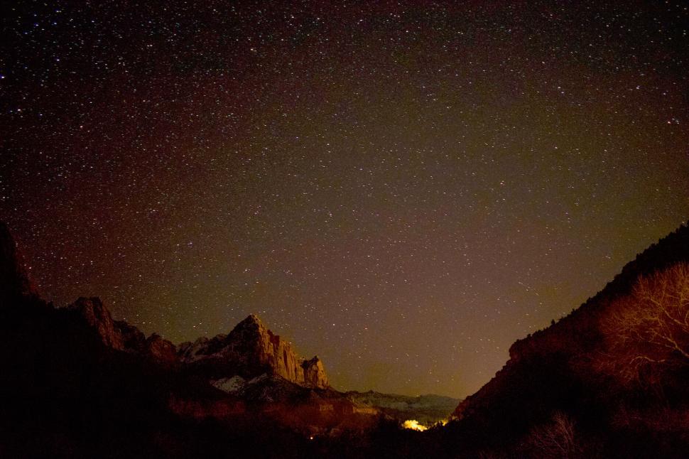 Free Image of Starry Night Over Mountainous Landscape 