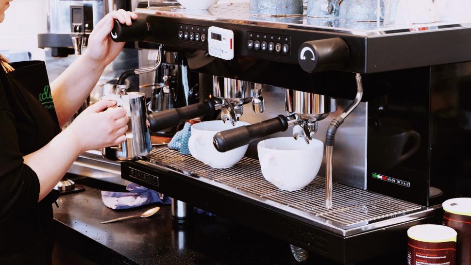 Free Image of Barista Crafting Coffee on Professional Machine 