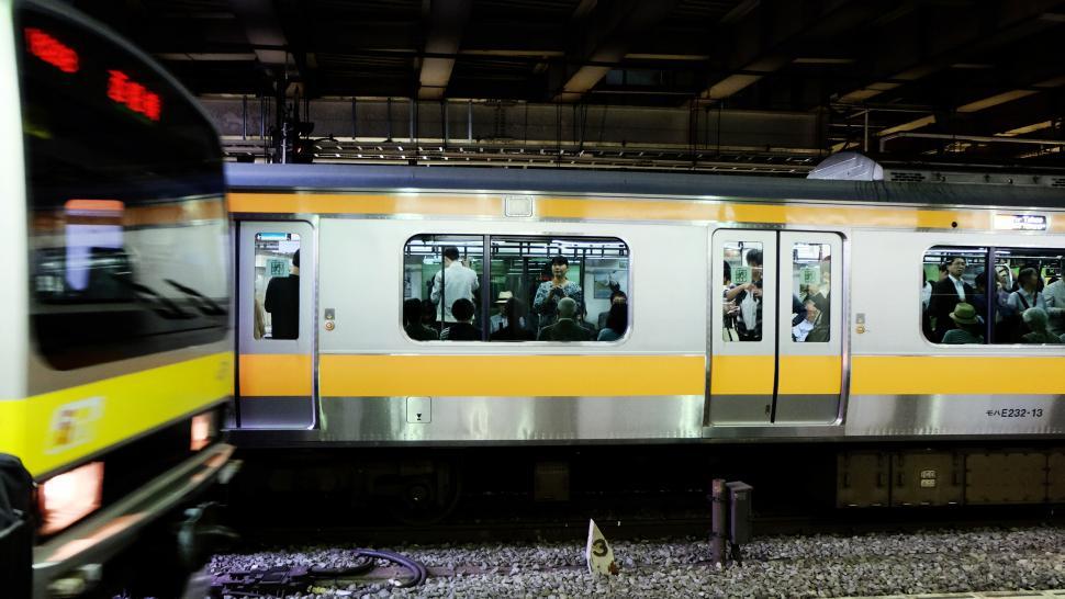 Free Image of Passengers in Train During Evening Commute 