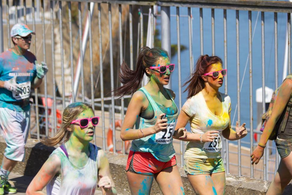 Free Image of Colorful runners at paint race event 