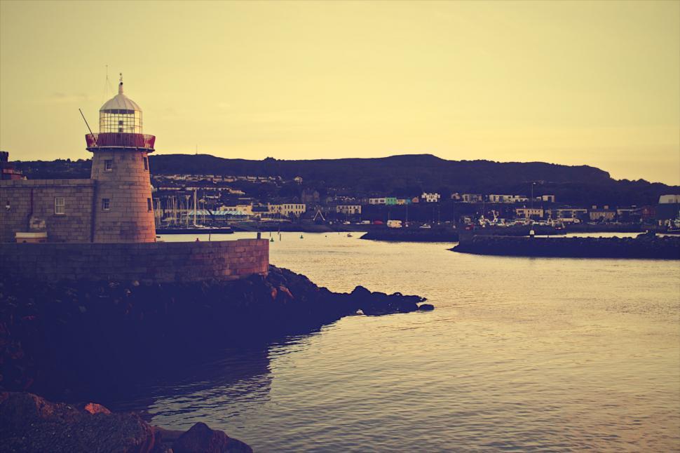 Free Image of Sunset view of a coastal lighthouse 