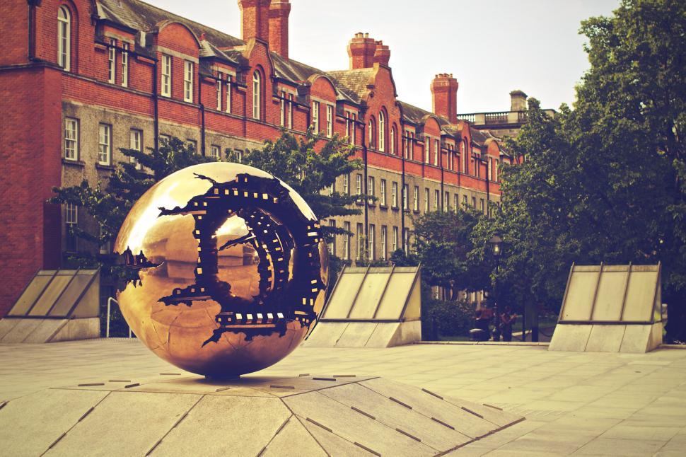 Free Image of Spherical sculpture in an urban square 