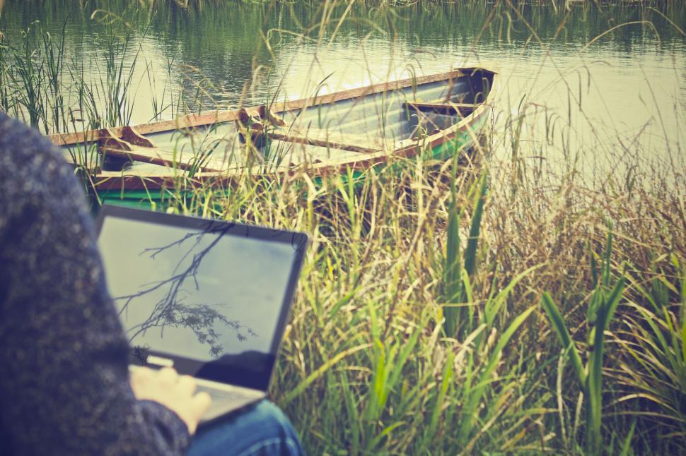 Free Image of Remote work concept with laptop by lake 