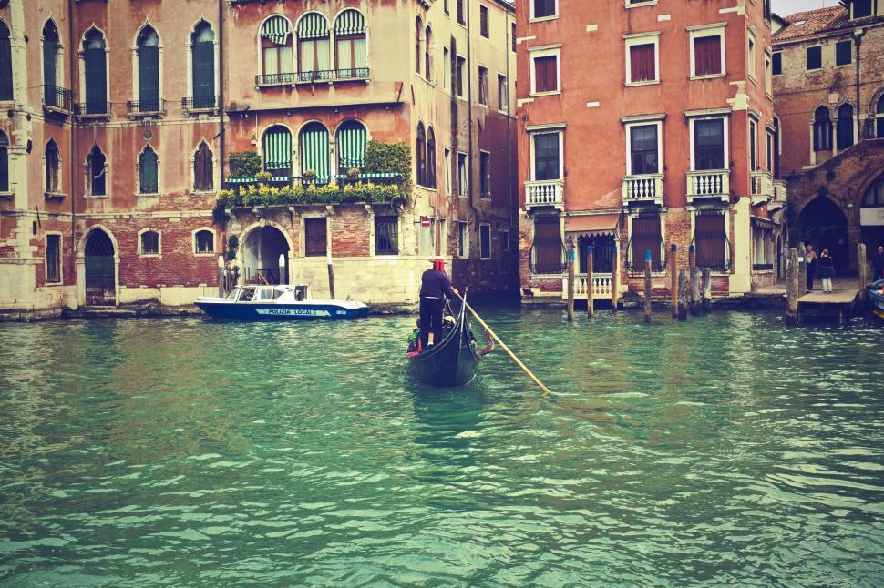 Free Image of Gondola navigating through Venice canals 