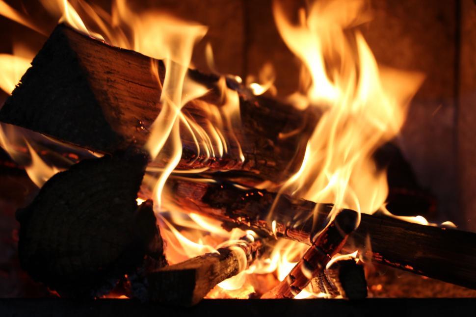 Free Image of Crackling firewood in a cozy fireplace 