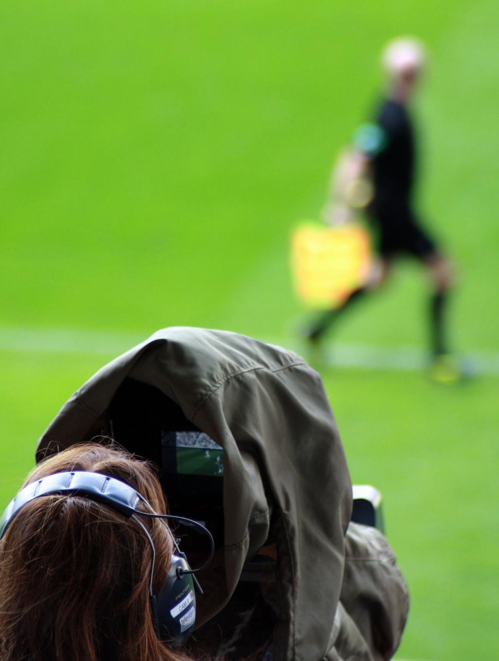 Free Image of Photographer capturing a sports event 