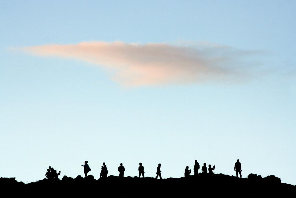 Free Image of Hikers on mountain ridge at sunset 
