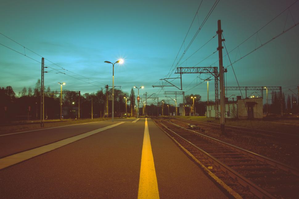 Free Image of Empty railway platform under twilight sky 