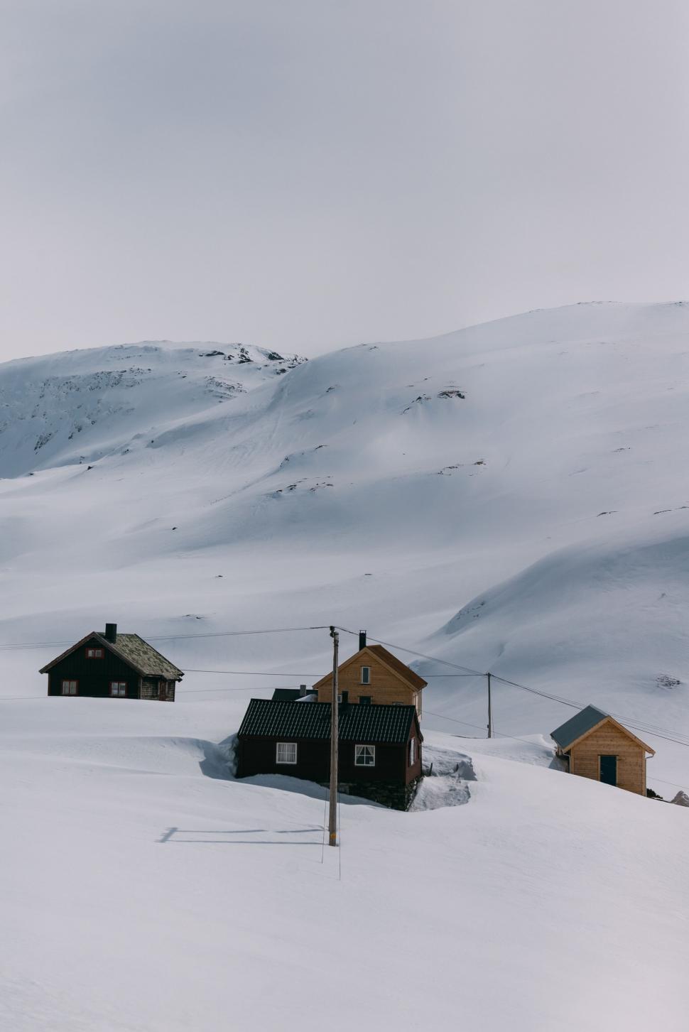 Free Image of Snowy mountain landscape with houses 