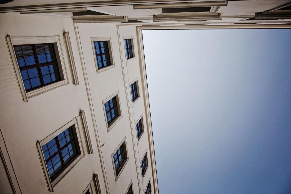 Free Image of Looking up at a building against the sky 