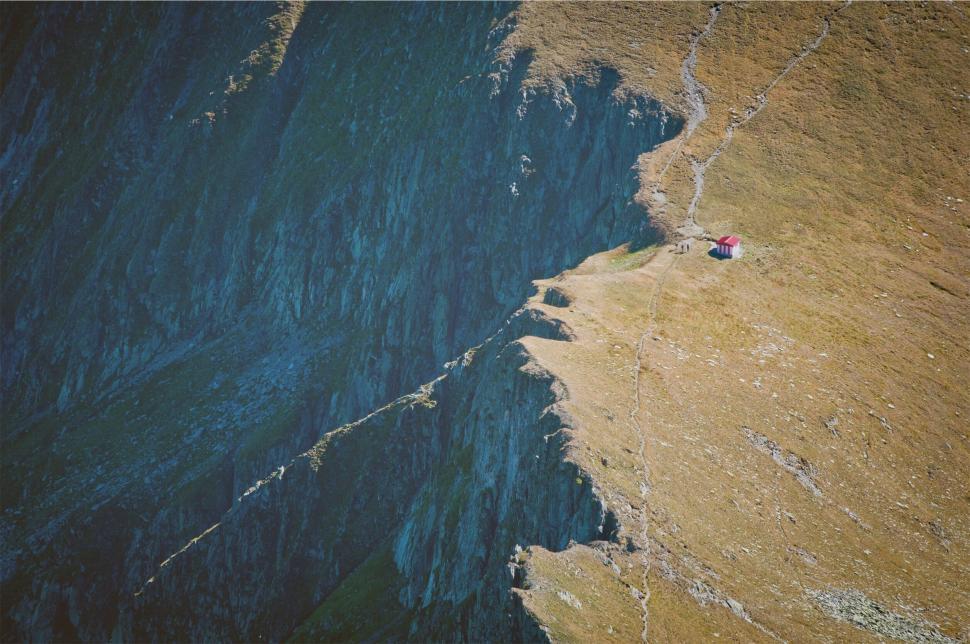 Free Image of Secluded mountain hut on a ridge 